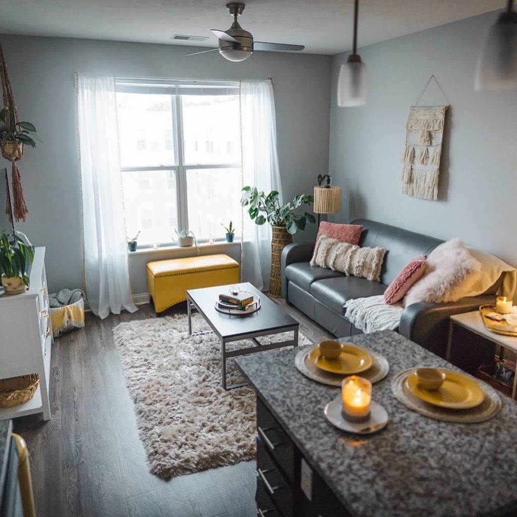 Living room with a large window and vinyl plank flooring